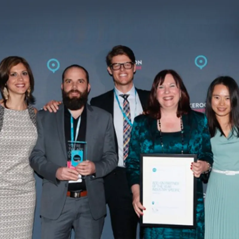 Scott (second from left) and the team of 5 people holding the Xero partner award.